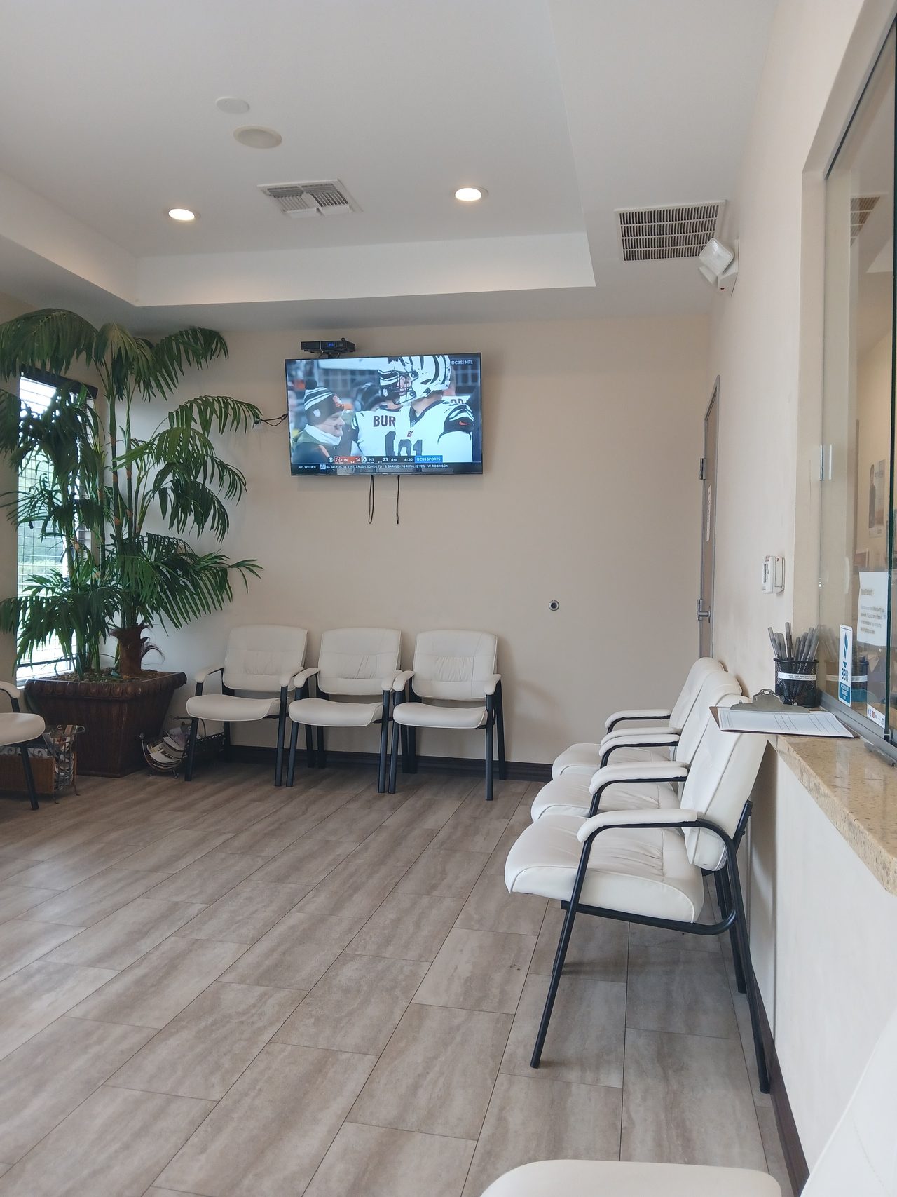 Waiting room and check-in window at Advanced Women's Center